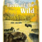 Bolsa de Taste of the Wild High Prairie junto a un perro adulto durante una evaluación científica de alimento premium para perros realizada por el Laboratorio AVC®.